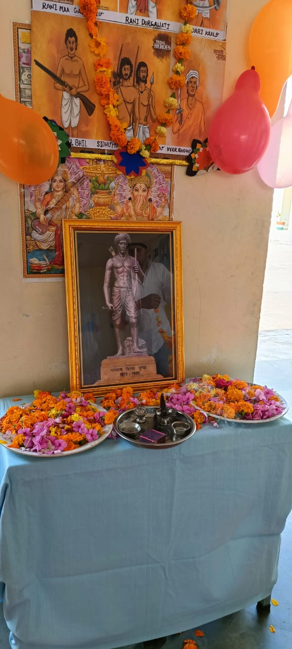 Cultural programme- Floral tribute to Bhagwan Birsa Munda,Pledge, Tribal songs,Tribal dance